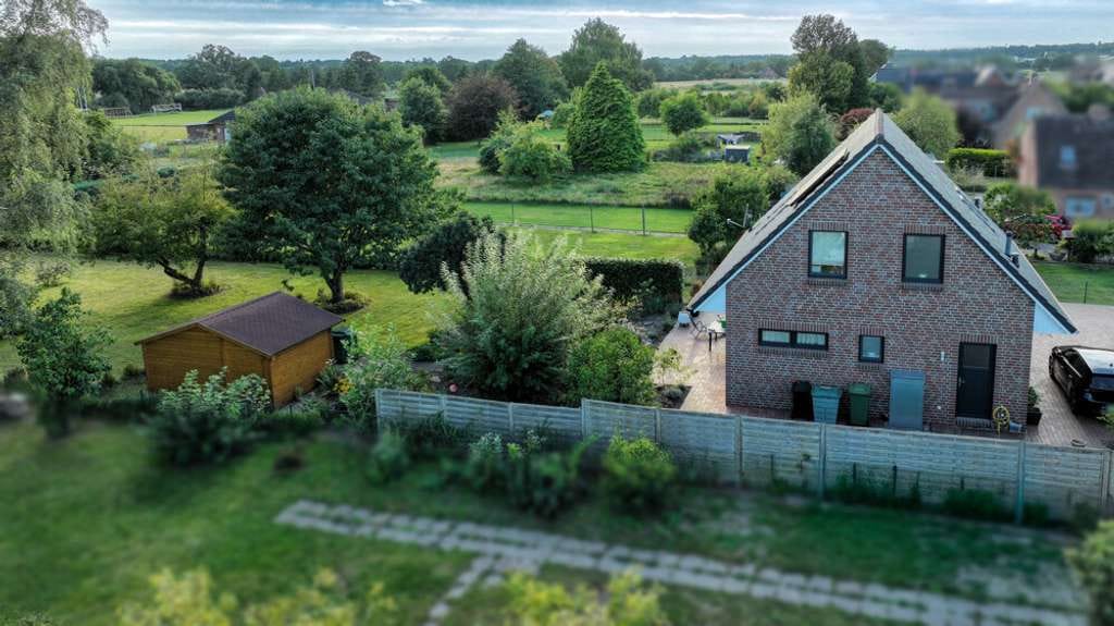 Immobilie in Lehmkuhlen - Wo Familie Zuhause ist – modernes Einfamilienhaus mit Wohlfühlatmosphäre - Bild 4