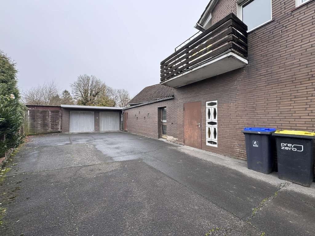 Immobilie in Ennigerloh - Gepflegtes Wohn- und Geschäftshaus mit integrierter Gewerbeeinheit
 - Bild 3