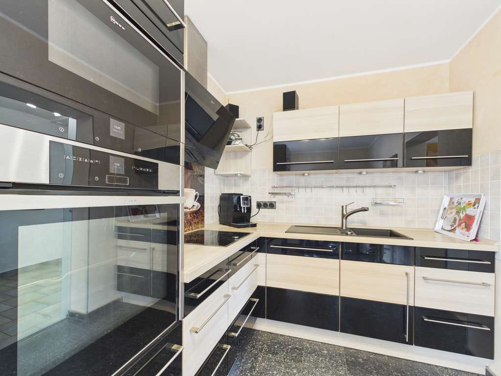 Immobilie in Kreuzau - KAPITALANLAGE MIT POTENZIAL: Großzügige Maisonettewohnung mit Garten & Garage - Bild 3