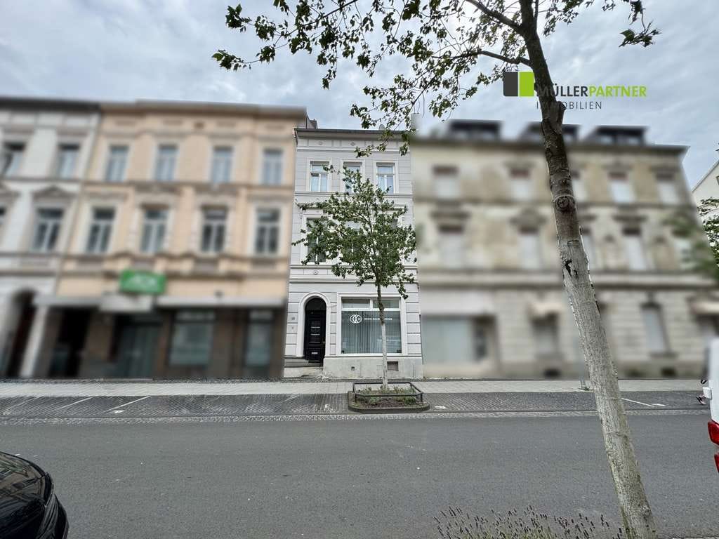 Immobilie in Eschweiler - Denkmalgeschütztes Wohn- und Geschäftshaus mit 7 Einheiten in zentraler Lage von Eschweiler! - Bild 1