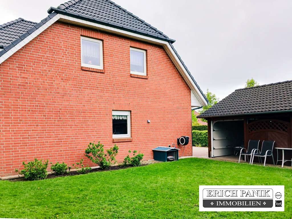 Immobilie in Bentwisch - Familienfreundliches Einfamilienhaus mit Wintergarten,  Doppelgarage & traumhaftem Garten  in Bentwi - Bild 2