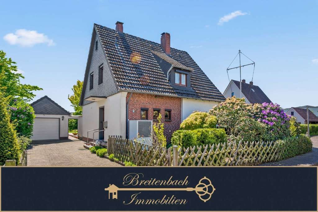 Immobilie in Elsfleth - Ihr neues Zuhause mit Charme, Kamin und liebevoll gestaltetem Garten - Bild 0