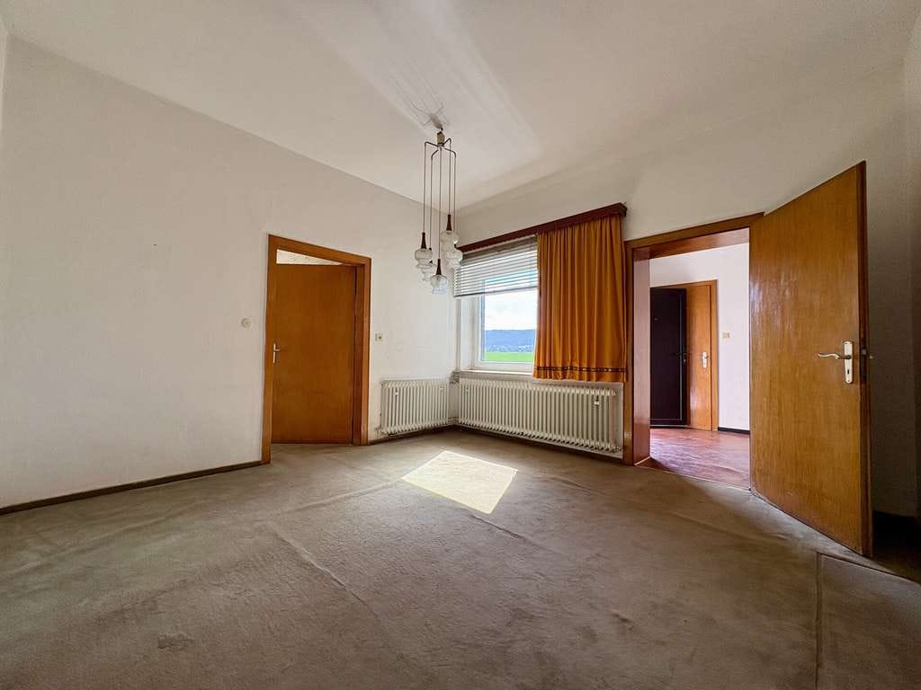 Immobilie in Minden - Wohnhaus mit ausbaufähigem Dachgeschoss & Blick auf das Wiehengebirge in Minden-Haddenhausen - Bild 3
