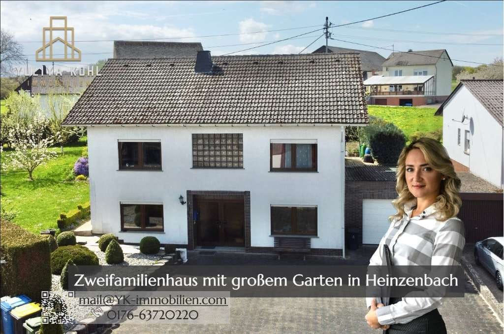 Immobilie in Heinzenbach - Ruhe, Raum und Perspektive in Heinzenbach: Großzügiges Zweifamilienhaus in idyllischer Hunsrücklage - Bild 0