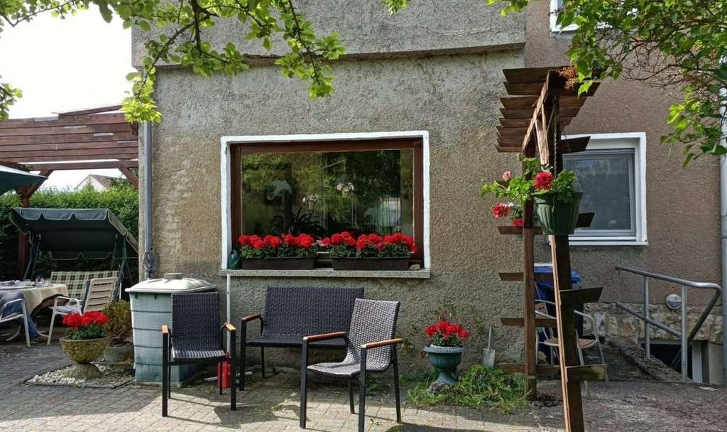 Immobilie in Menteroda - Reihenendhaus mit großem Gartengrundstück in Ortsrandlage von Menteroda - Bild 3