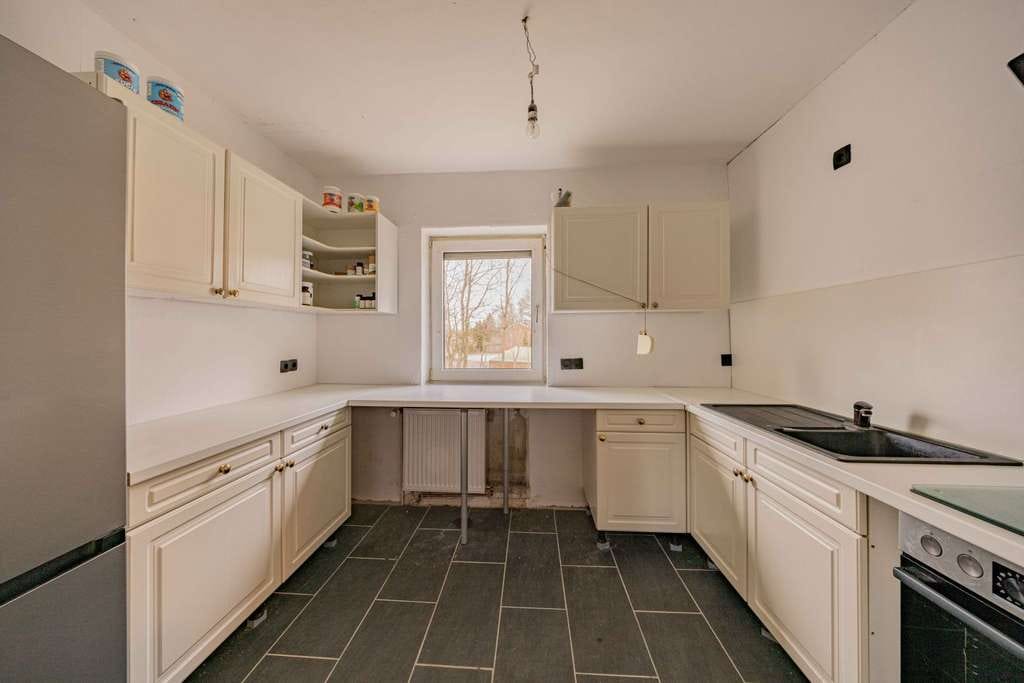 Immobilie in Gönnebek - Zweifamilienhaus mit Baugrundstück und wohnlich ausgebautem Dachboden in Trappenkamp - Bild 3