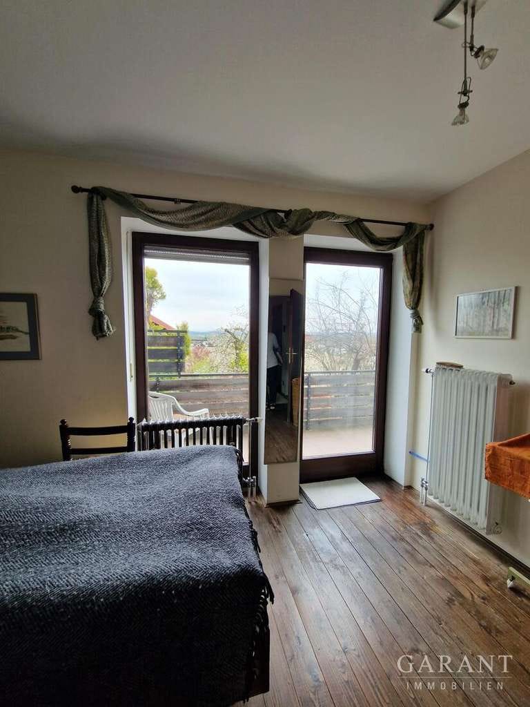 Immobilie in Stubenberg - Charmantes Einfamilienhaus mit Einlieger-/Gewerbebereich und Alpenblick - Bild 1
