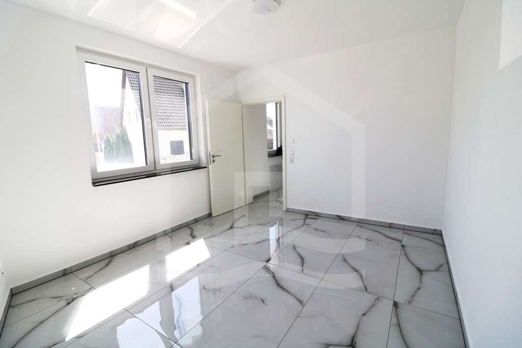 Immobilie in Helmstadt-Bargen - Moderne Erdgeschosswohnung mit exklusiver Ausstattung und großem Garten - Bild 2
