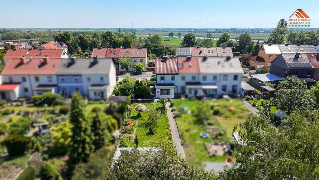 Immobilie in Calbe (Saale) - Platz für die Familie: Reihenendhaus mit Garage und Garten in Calbe (Saale) - Bild 1