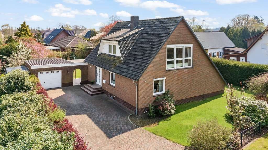 Immobilie in Schiffdorf - Schiffdorf - Familienfreundliches Einfamilienhaus in traumhafter Lage - Bild 1