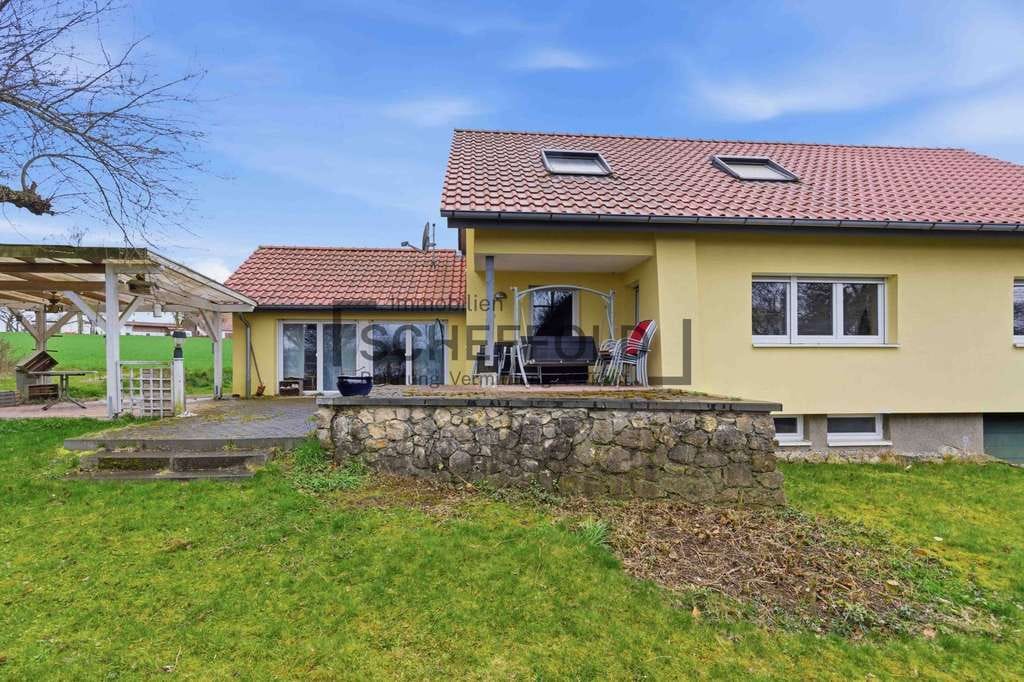 Immobilie in Burgrieden - Raumwunder! Einfamilienhaus in naturnaher Lage und großem Grundstück - Bild 3