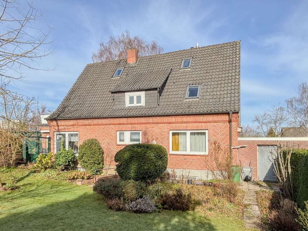 Immobilie in Kronshagen - Raum für Generationen und Ideen - Einfamilienhaus mit Einliegerwohnung in Kronshagen - Bild 0