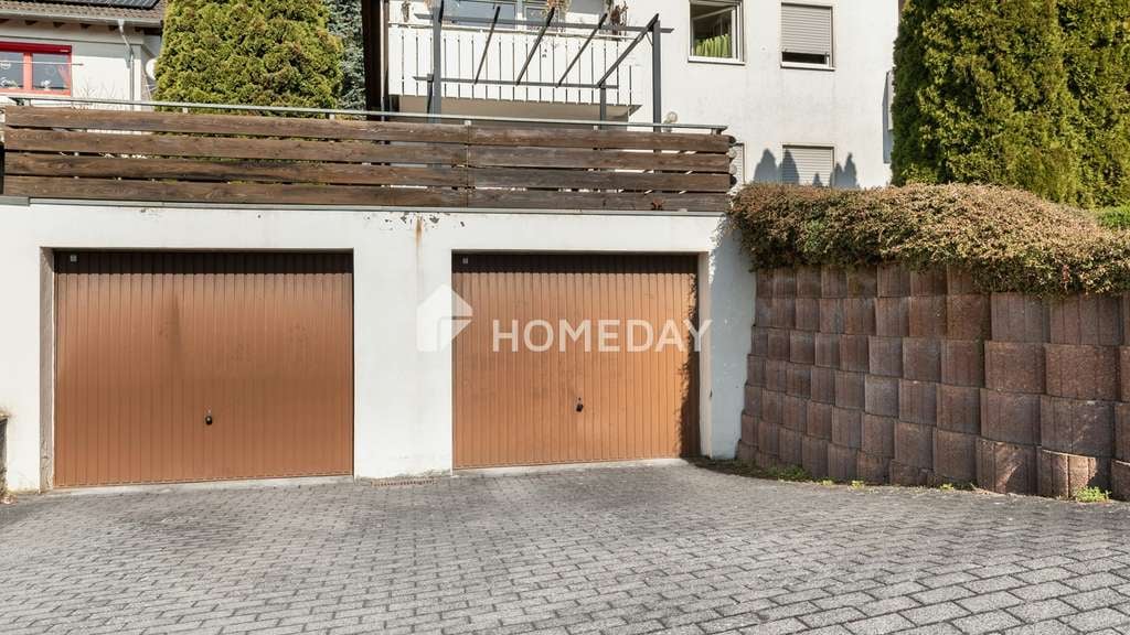 Immobilie in Bad Soden-Salmünster - Teilvermietetes Mehrfamilienhaus mit 4 Einheiten, Balkonen, Terrasse und Stellplätzen - Bild 1