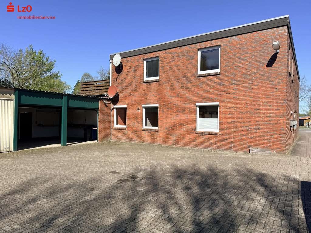 Immobilie in Westerstede - Bezugsfreie Erdgeschosswohnung in Linswege mit 4 Garagen - Bild 0