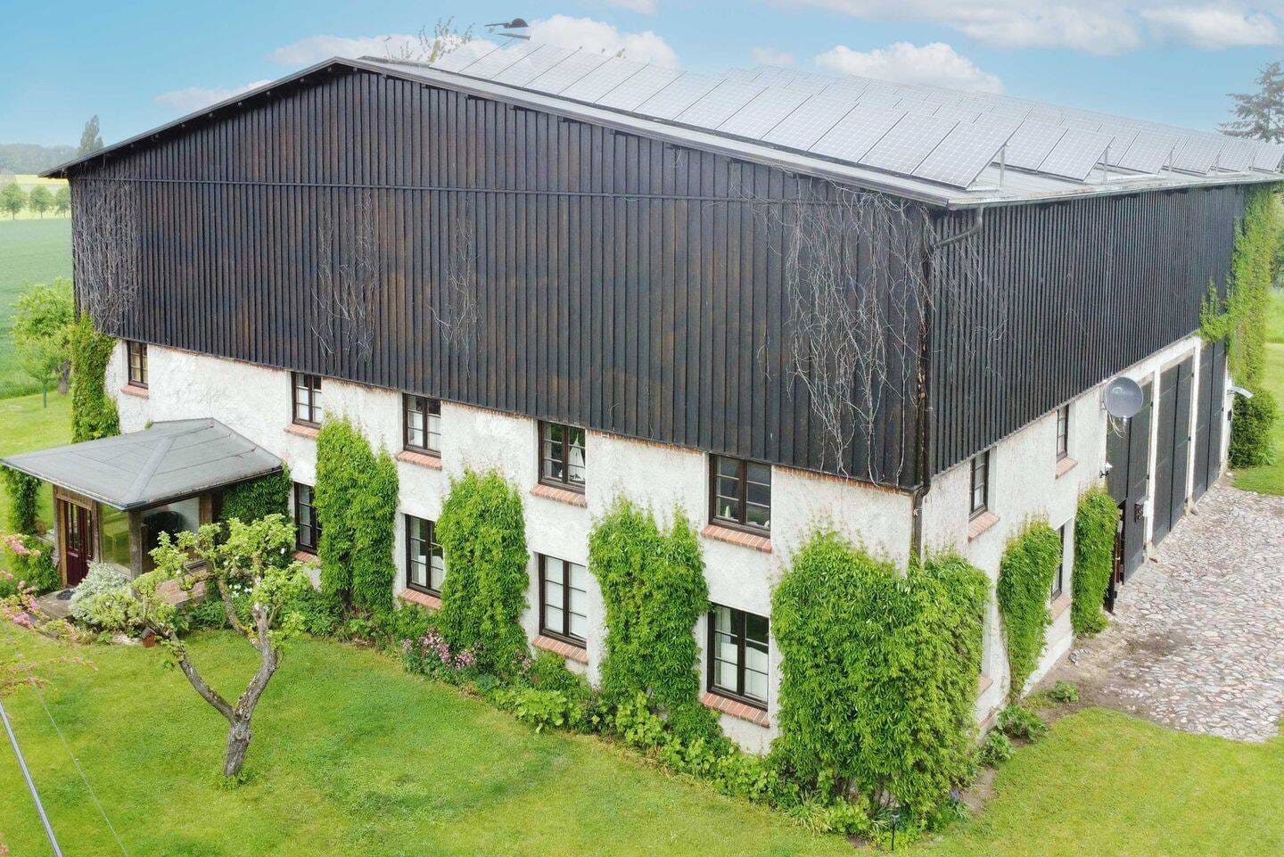 Immobilie in Warnow - Ostseenahe Investitionschance: Erfolgreiches Ferienwohnungsensemble in historischer Gutsscheune - Bild 0
