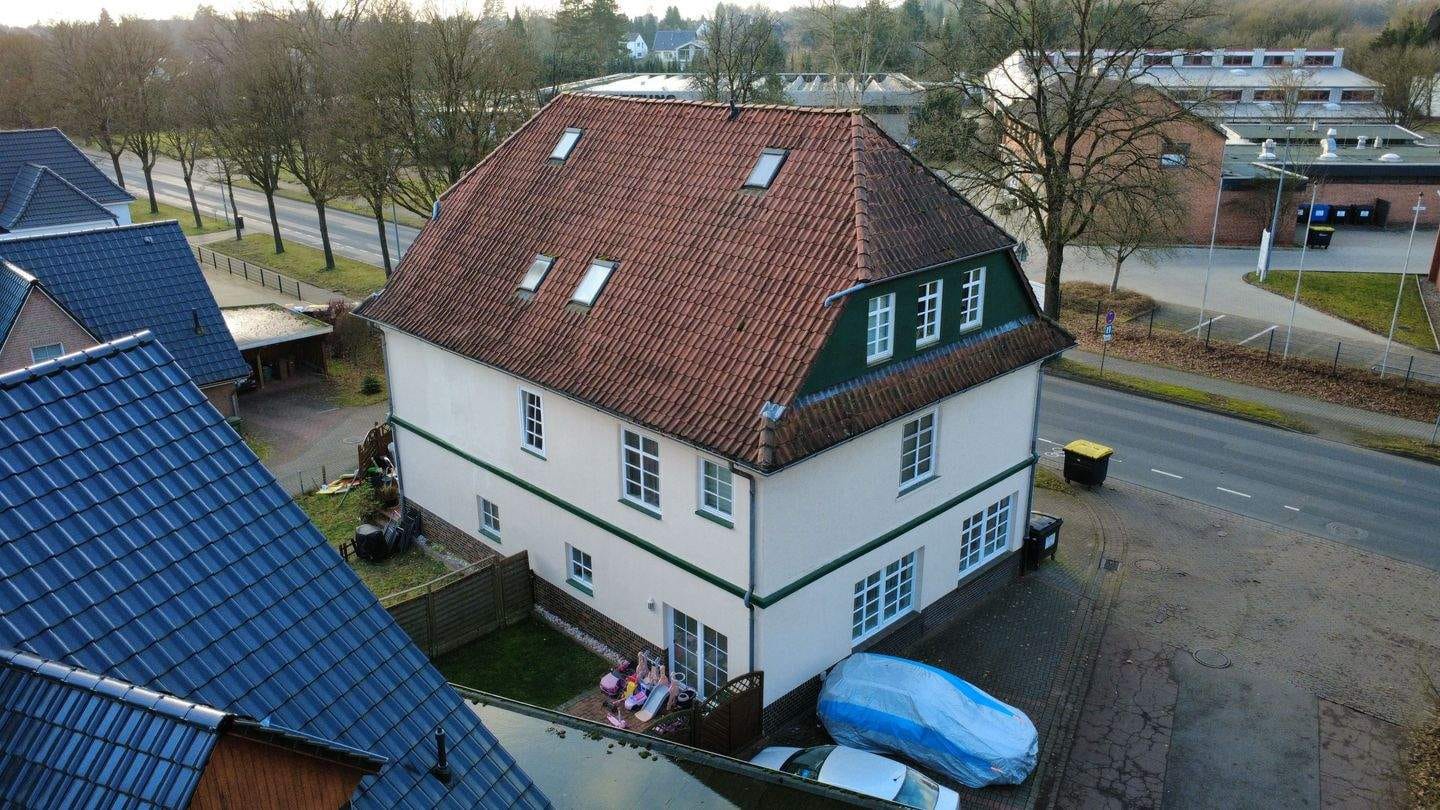 Immobilie in Soltau - Mehrfamilienhaus mit 5 Wohneinheiten und 5 Garagen - Bild 2