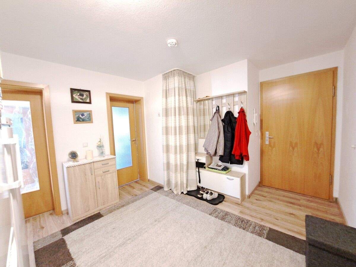 Immobilie in Mulda/Sachsen - Stilvolle Erdgeschoss-Wohnung zum Verkauf: 4 Räume, Tiefgarage, großzügige Terrasse in Mulda/Sa.! - Bild 1
