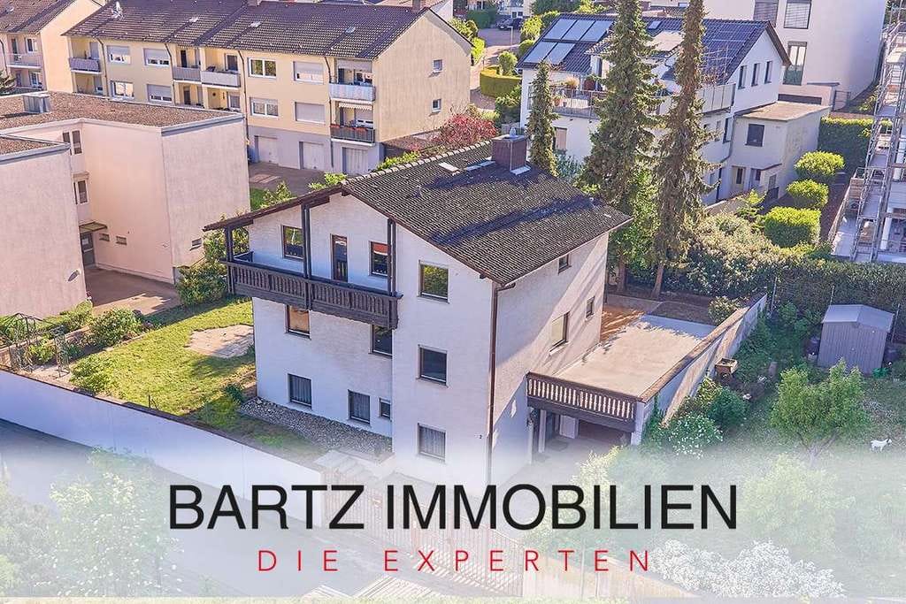 Immobilie in Grünstadt - Familienfreundliches Haus mit großer Terrasse, optimaler Raumaufteilung & Einliegerwohnung - Bild 0