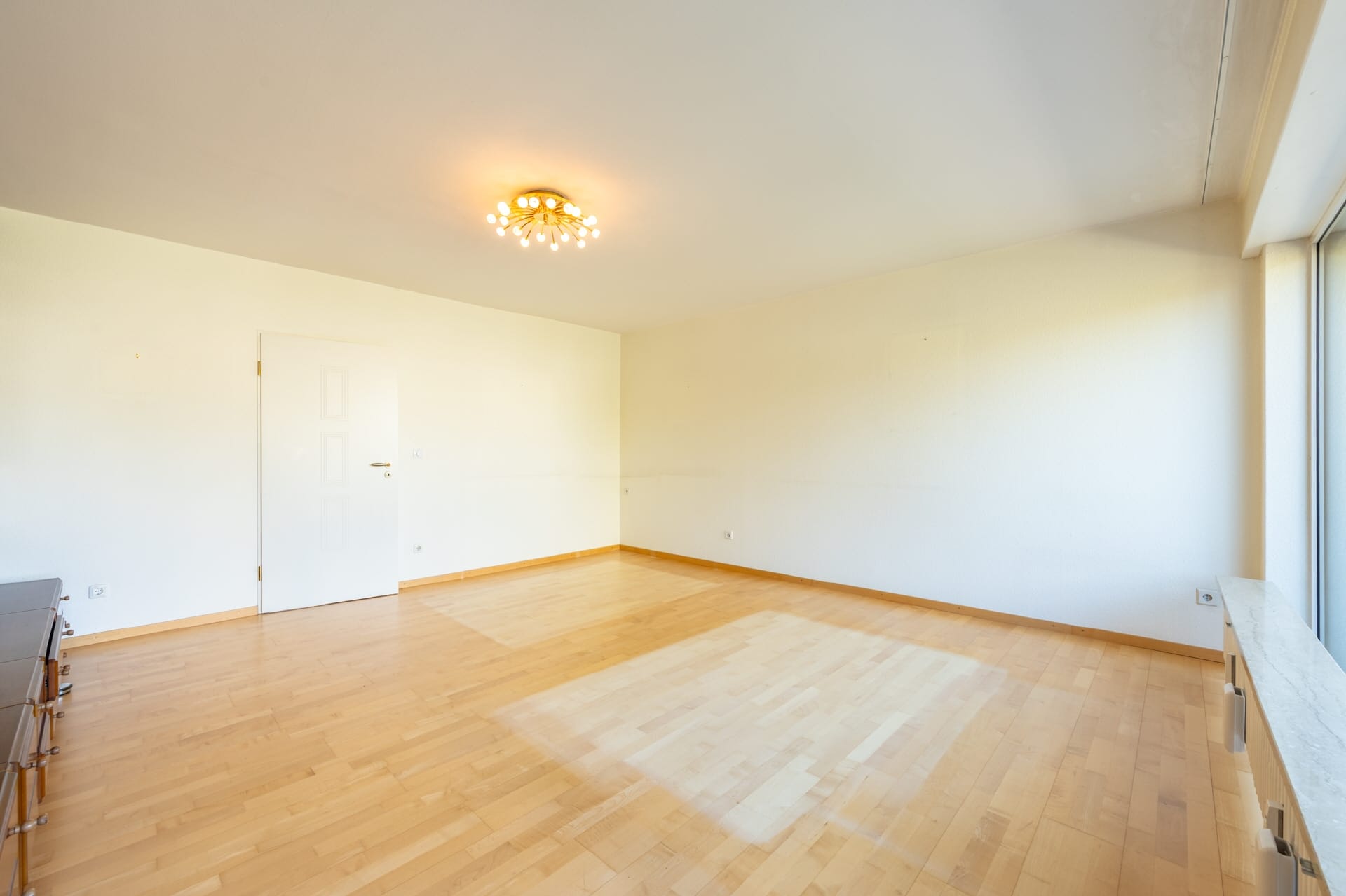 Immobilie in Gröbenzell - AIGNER - großzügige Maisonette mit sonnigem West-Balkon in zentraler Lage - Bild 1