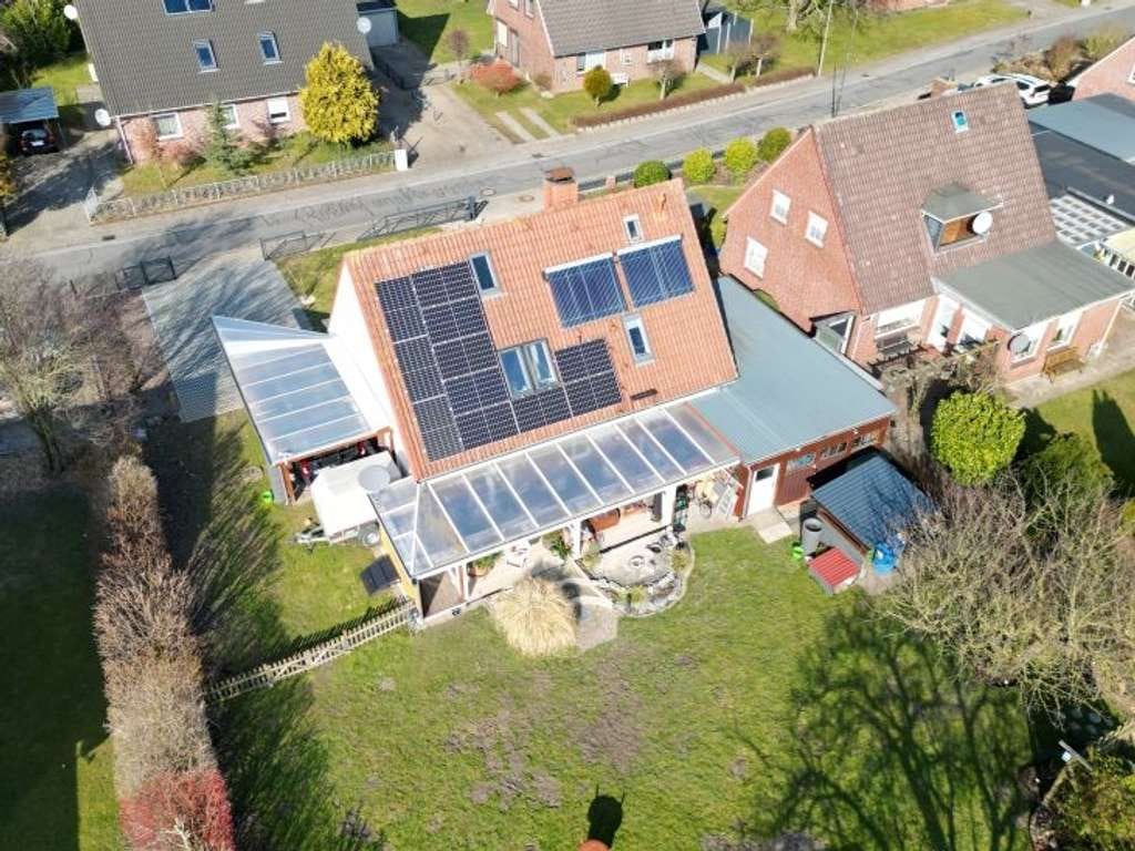 Immobilie in Kaiser-Wilhelm-Koog - Nordseenahes Einfamilienhaus bei Friedrichskoog mit Wohnmobil-Carport und Platz fürs Hobby - Bild 1