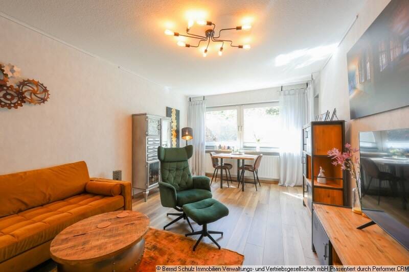 Immobilie in Appen - Modernisierte 4-Zimmer Erdgeschosswohnung mit großem Garten und Stellplatz - Bild 2