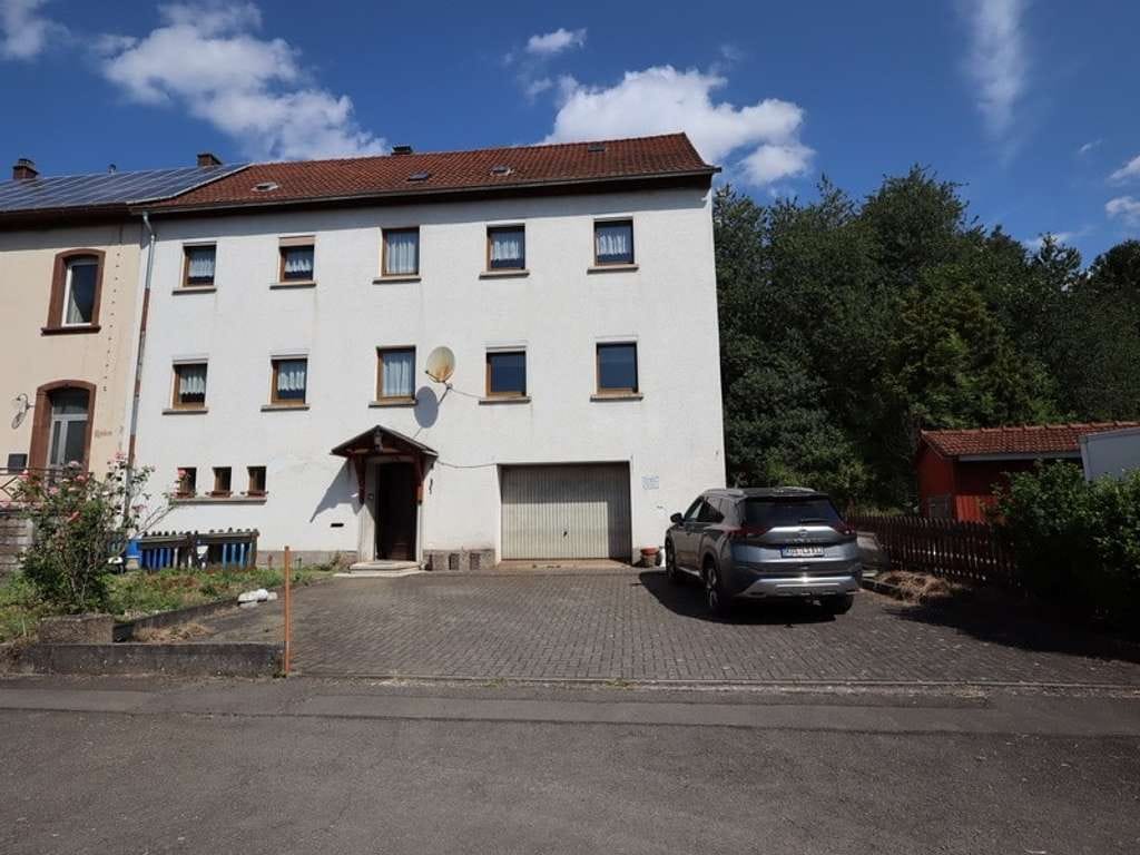 Immobilie in Horschbach - Geräumiges Zweifamilienhaus mit Gestaltungsmöglichkeiten - Bild 0