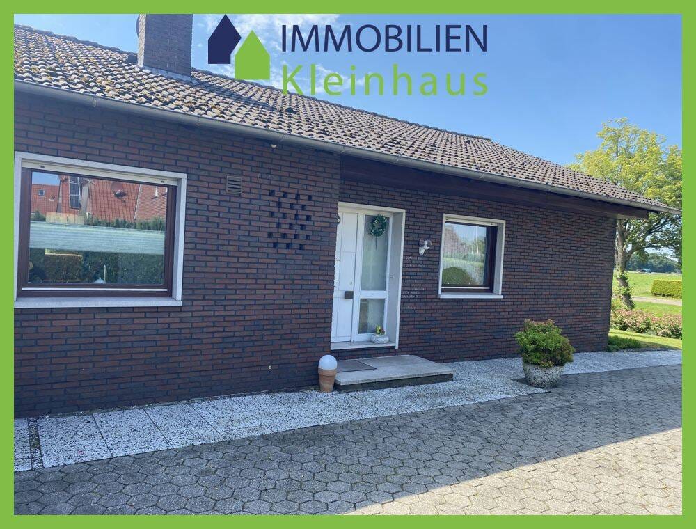 Immobilie in Papenburg - Gepflegtes ebenerdiges Wohnhaus mit Einliegerwohnung in idyllischer Kanallage von Papenburg - Ortsteil Obenende - Bild 1