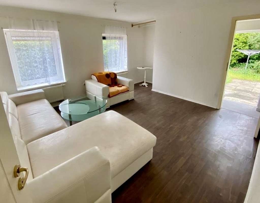 Immobilie in Moorrege - Charmantes Dreifamilienhaus in Moorrege – ideal für Kapitalanleger und Familien! - Bild 1