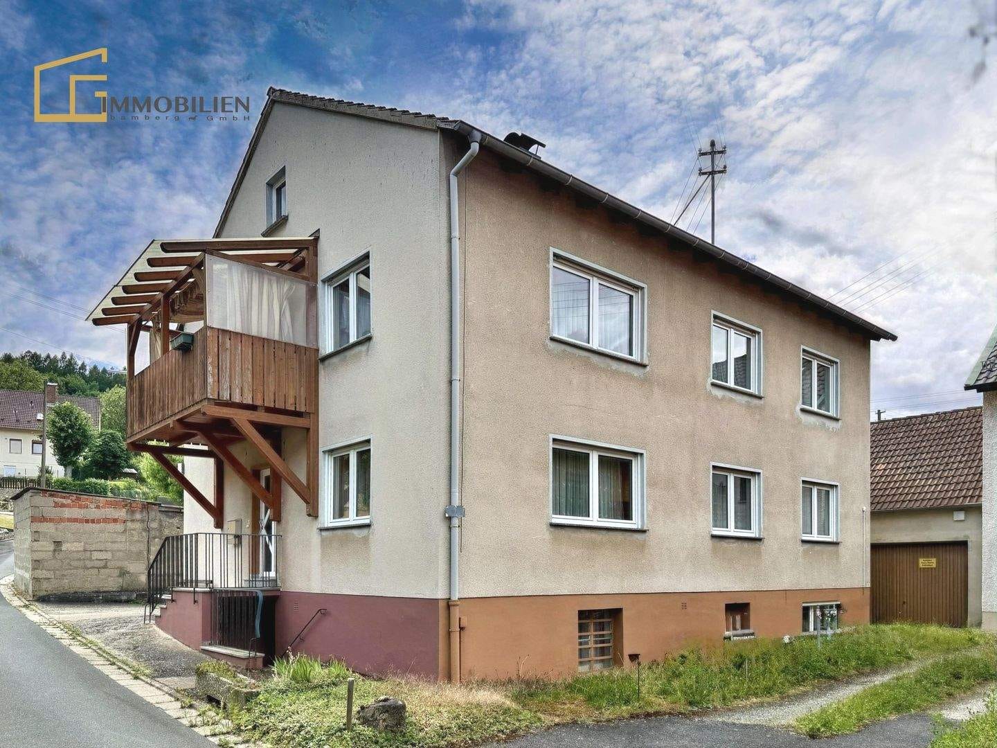 Immobilie in Scheßlitz - Zweifamilienhaus mit viel Raum für Hobby & Handwerk - Bild 1