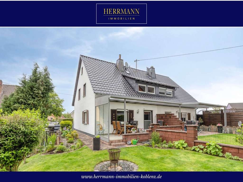 Immobilie in Weißenthurm - Stilvoll modernisierte Doppelhaushälfte mit Garten und Doppelgarage in attraktiver Wohnlage - Bild 0