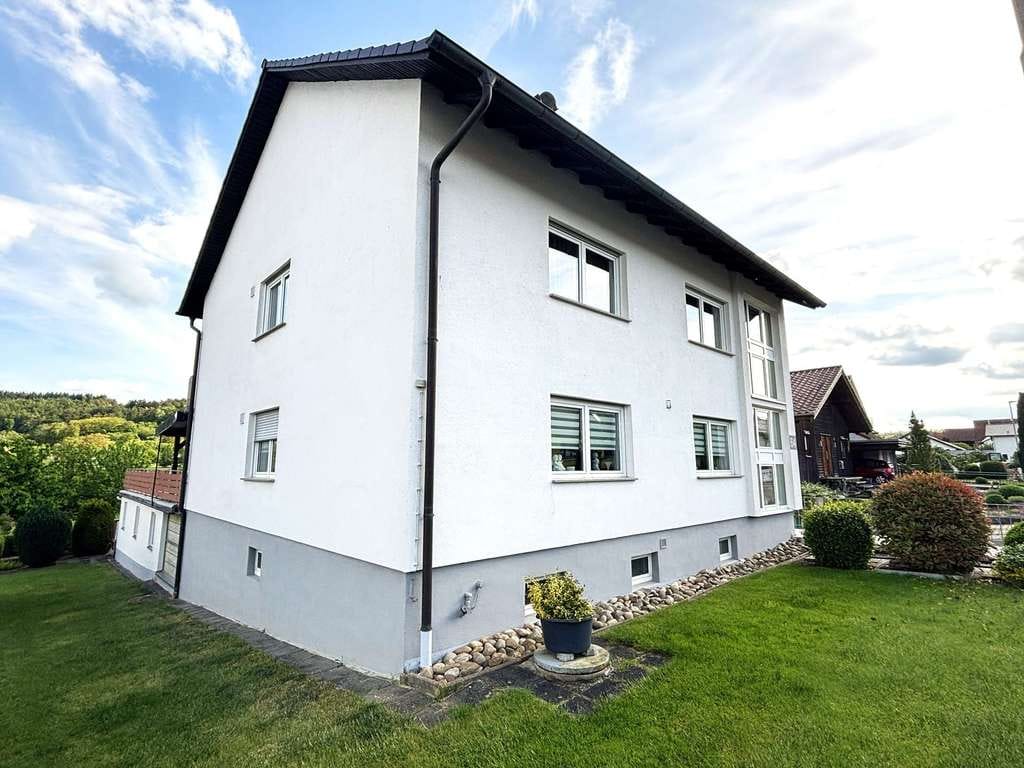Immobilie in Höpfingen - Großzügiges Wohnhaus mit drei Wohneinheiten, 4 Garagen und traumhafter Feldrandlage in Höpfingen - Bild 3