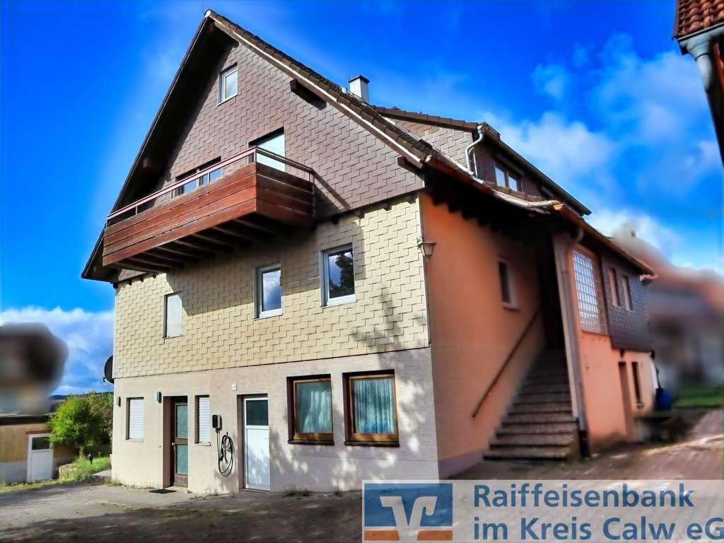 Immobilie in Neuweiler - Wohnhaus mit Einliegerwohnung, Garage und Scheune in ruhiger Lage und ländlicher Umgebung. - Bild 0