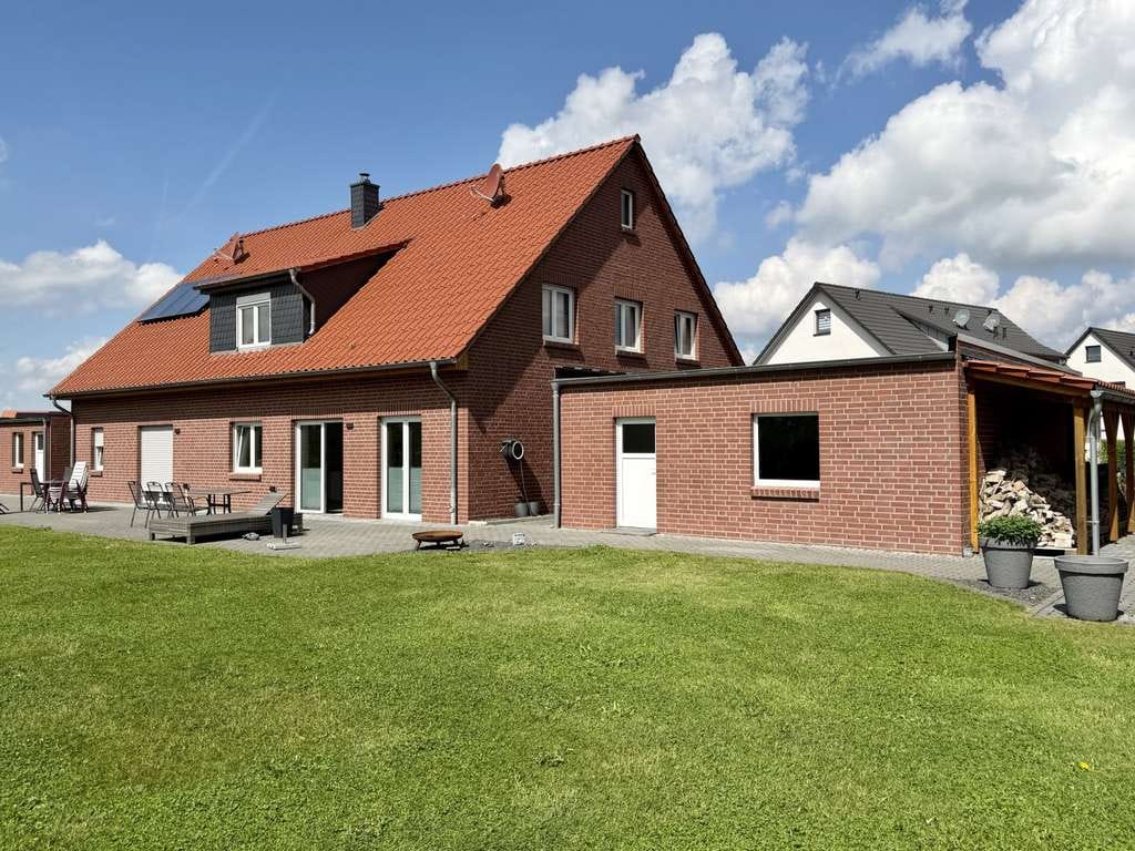 Immobilie in Sachsenhagen - moderne Doppelhaushälfte KfW 55 in Feldrandlage - Bild 0
