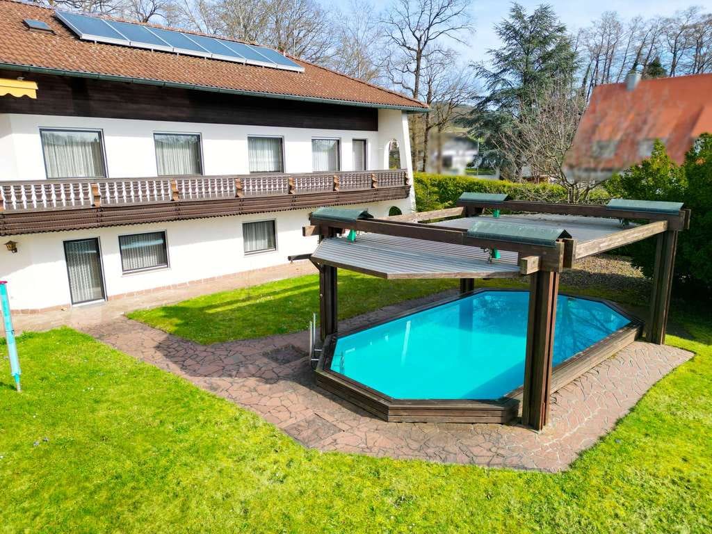 Immobilie in Röthenbach an der Pegnitz - Stilvolles Anwesen in Feldrandlage am Moritzberg mit Pool, Sauna & großzügigen Parkmöglichkeiten - Bild 3