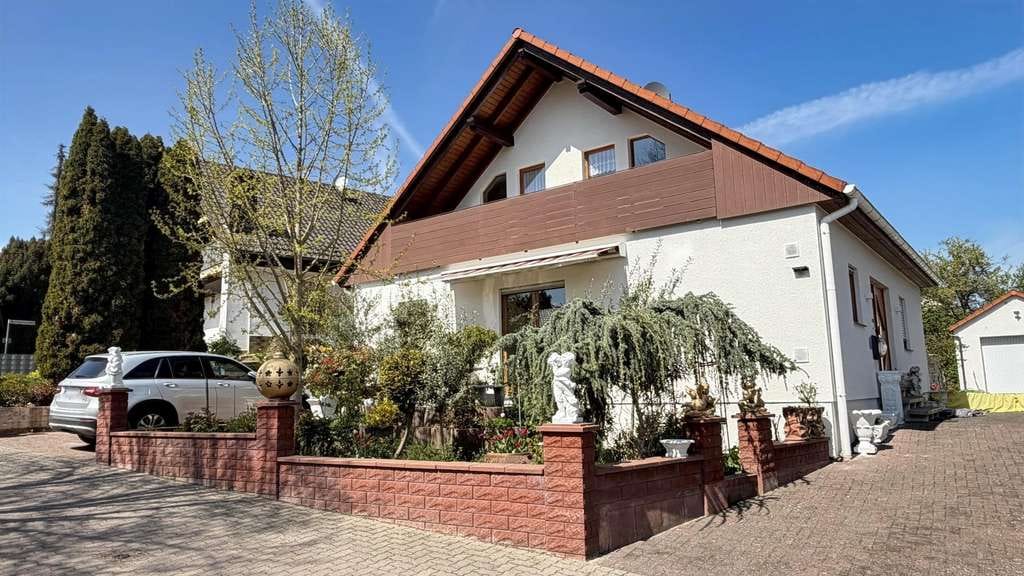 Immobilie in Ober-Flörsheim - gepflegtes Einfamilienhaus mit Einliegerwohnung!  - Bild 1