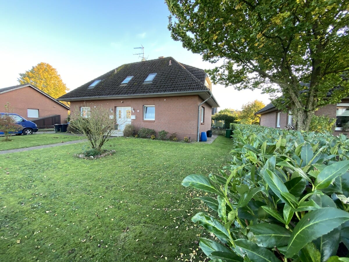 Immobilie in Kutenholz - Attraktives Zweifamilienhaus in zentraler Lage von Kutenholz - Bild 1