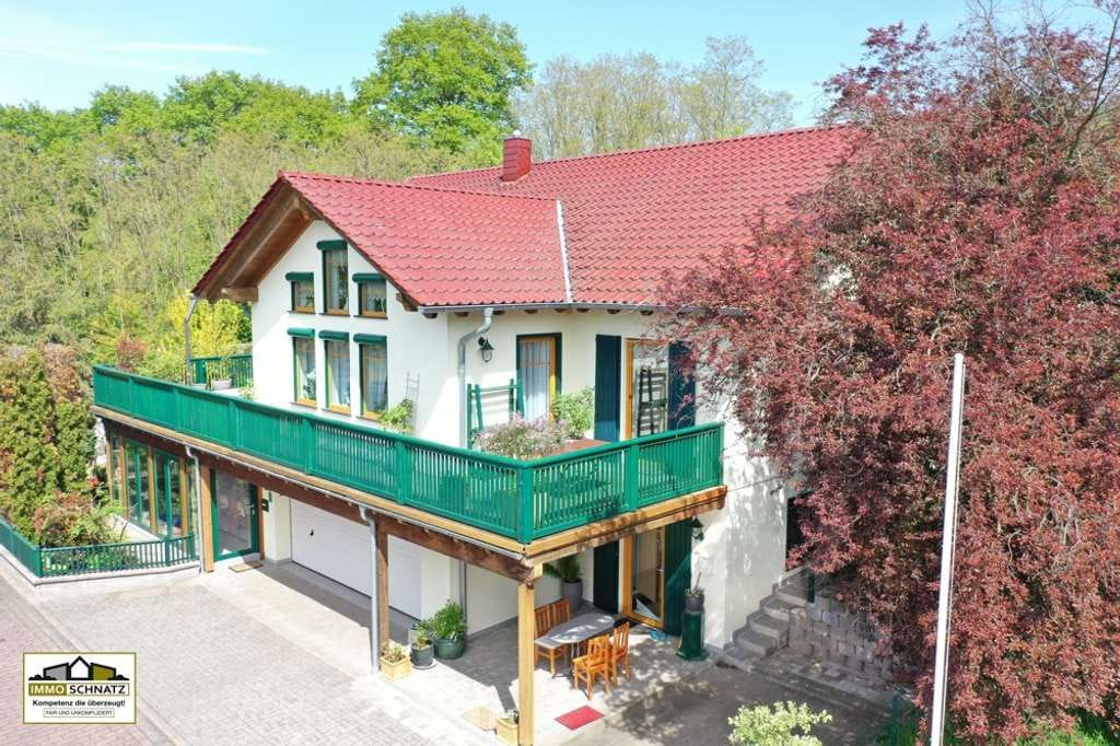 Immobilie in Großheubach - Vielseitiges Wohnensemble – Einfamilienhaus mit vermieteter ELW (Zweitwohnsitz) & Gästehaus - Bild 0