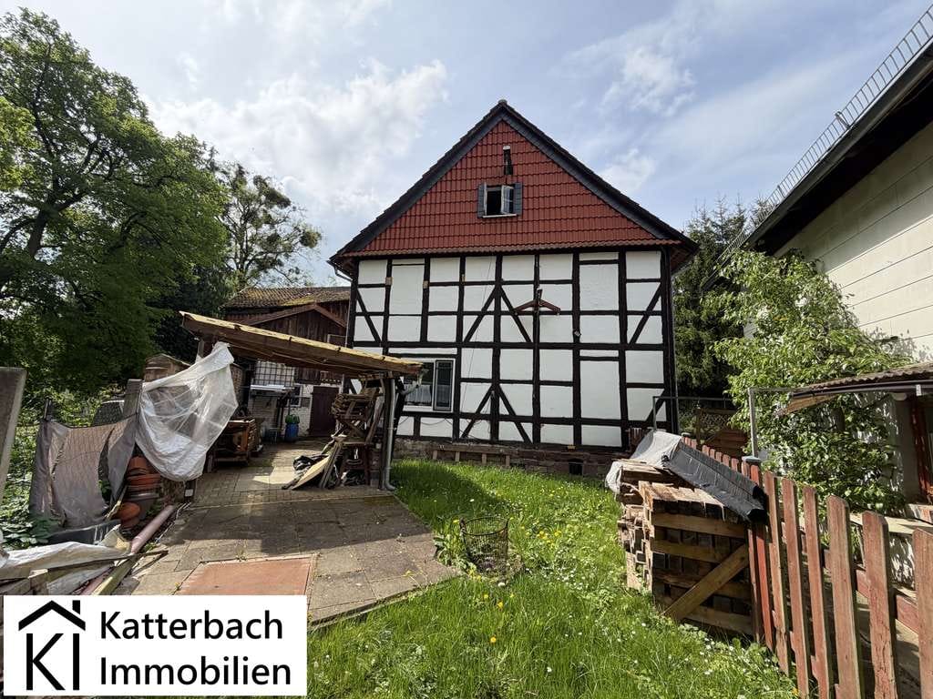 Immobilie in Kalefeld - Charmante Doppelhaushälfte mit separatem Gartenland im idyllischen Oldershausen - Bild 1