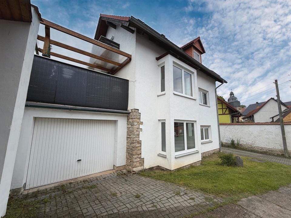 Immobilie in Unstrut-Hainich - Charmantes Einfamilienhaus mit PV-Anlage, Kaminöfen & zwei Garagen - Bild 0