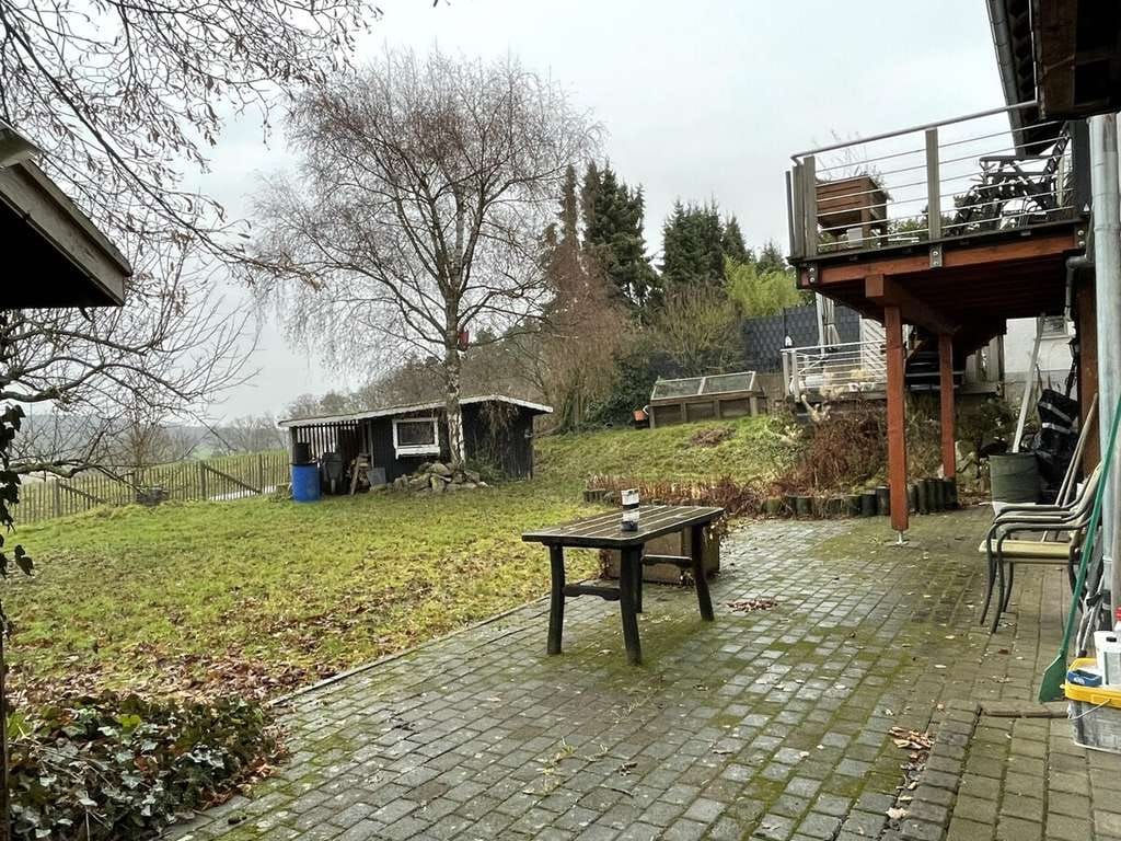 Immobilie in Hohenahr - 35644 Hohenahr-Erda

Wohnhaus mit außergewöhnlichem Weitblick, tollem Garten und großer Garage - Bild 1