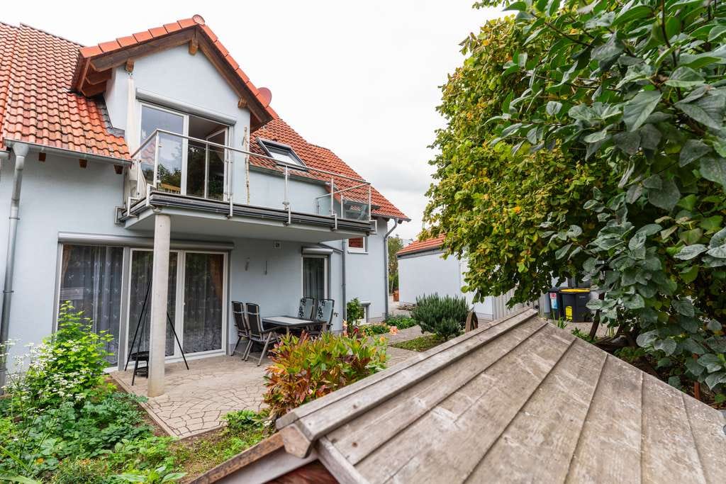 Immobilie in Sörgenloch - Gepflegte DHH: flexible Nutzung mit 2 Wohnungen + Einliegerapartment | Terrasse/Balkon - Bild 4