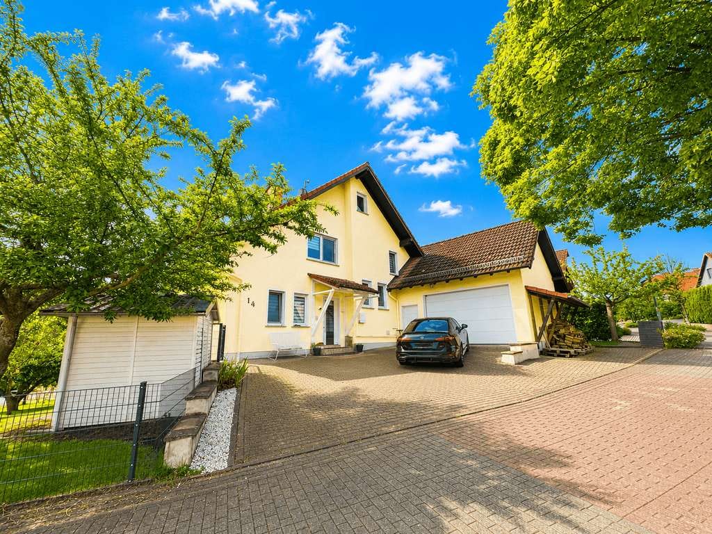 Immobilie in Langgöns - Modernisiertes Haus mit PV-Anlage, Sauna, Einliegeroption & gehobener Ausstattung in Langgöns - Bild 0