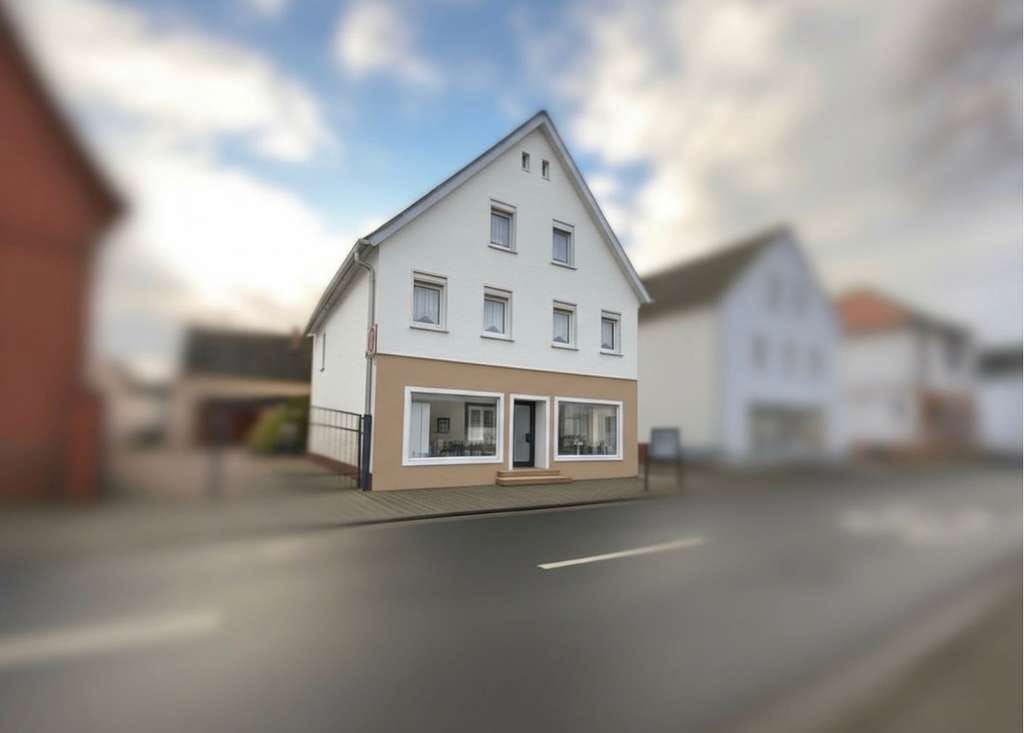 Immobilie in Raunheim - Gepflegtes Mehrfamilienhaus mit integrierter Gewerbefläche und weiterem Entwicklungspotenzial - Bild 1