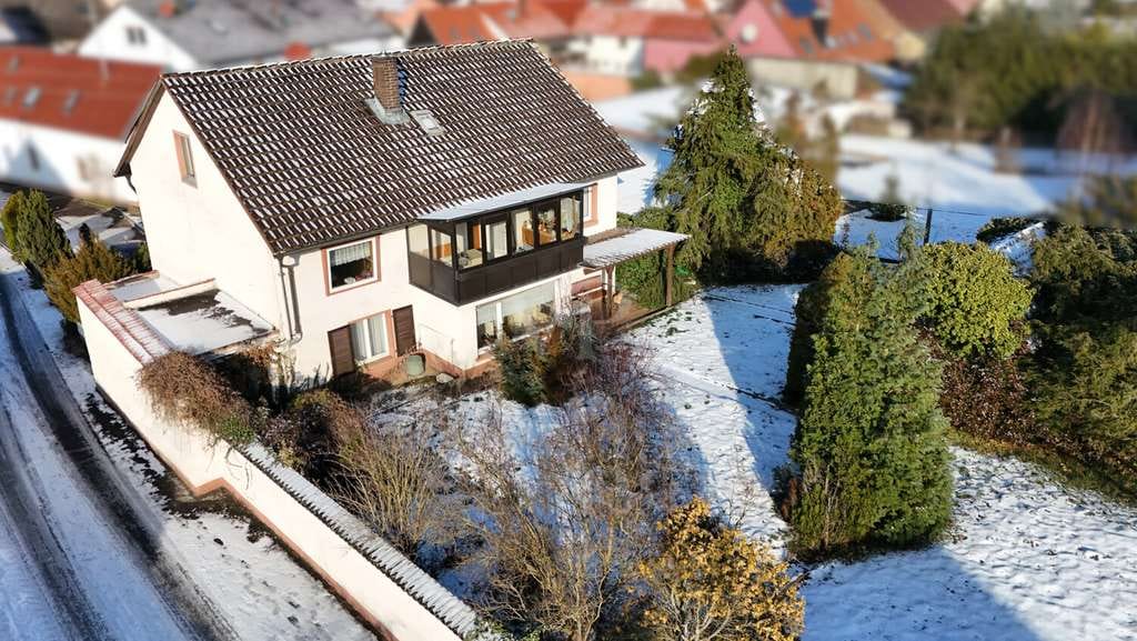 Immobilie in Wertheim - Großzügiges Baugrundstück mit Garage und Altbestand - Bild 0