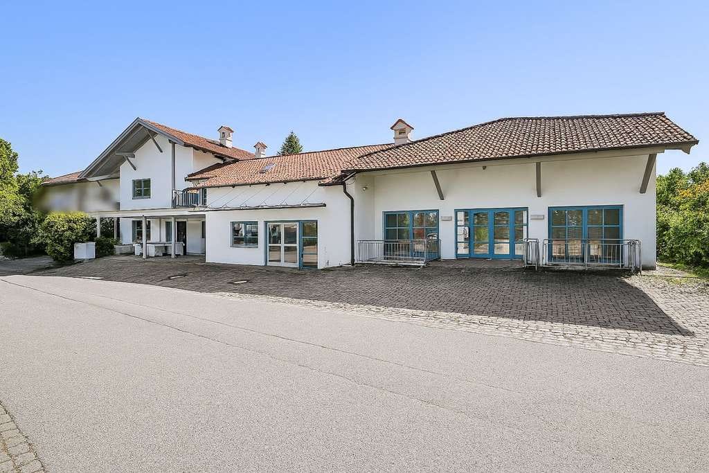 Immobilie in Aschau am Inn - Modernisiertes Mehrparteienhaus mit Büros in Aschau-Werk - Bild 2