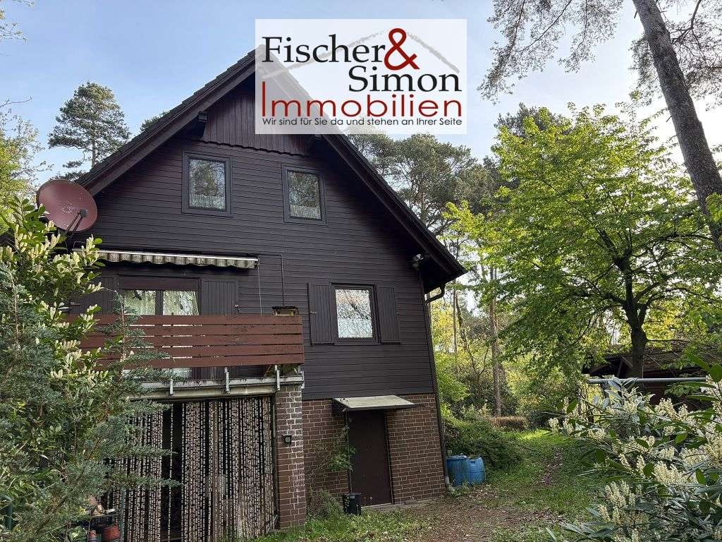 Immobilie in Steyerberg - Steyerberg- charmantes Holzhaus mit massivem Vollkeller in naturnaher, ruhiger Hanglage - Bild 3