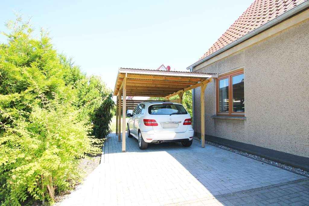 Immobilie in Broderstorf - Einfamilienhaus mit Gartenidylle an der Stadtgrenze Rostock! - Bild 2