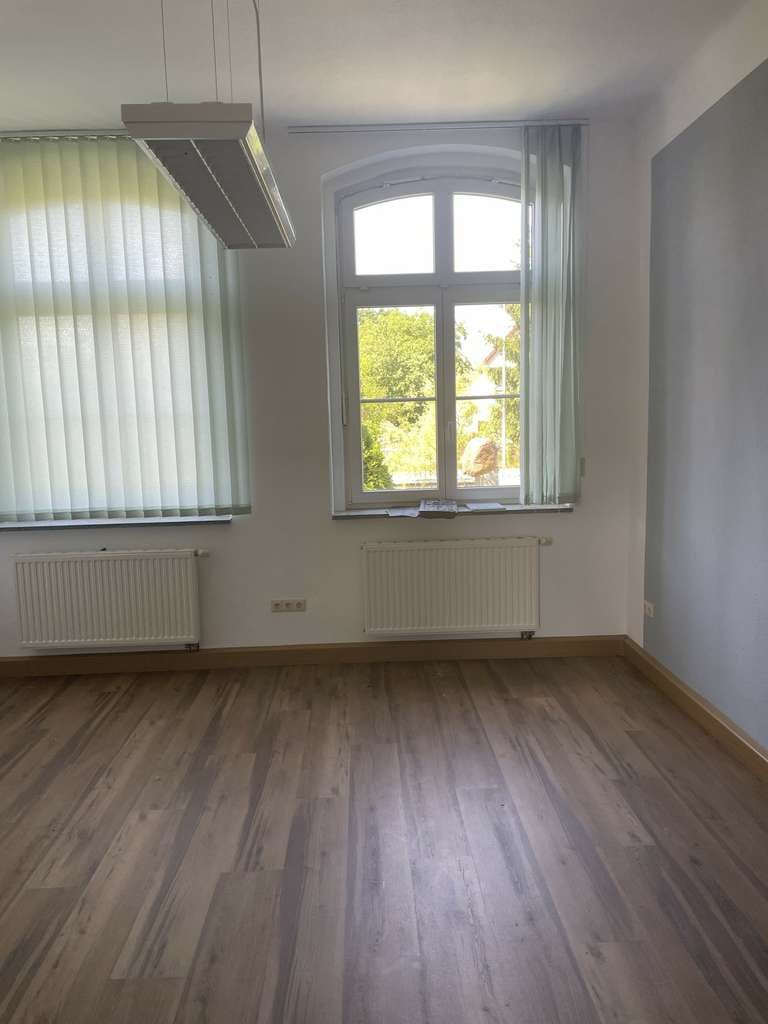 Immobilie in Rothenburg/Oberlausitz - Modernisiertes Mehrfamilienhaus mit attraktiver Gewerbeeinheit – Ihre Investitionschance! - Bild 3