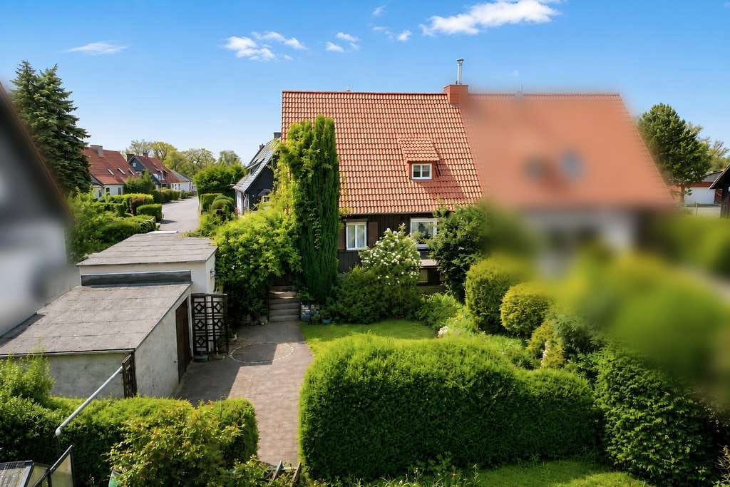 Immobilie in Niedere Börde - Charmante Doppelhaushälfte in Finnland-Bauweise mit Garten, Vollkeller und Gestaltungspotenzial - Bild 1