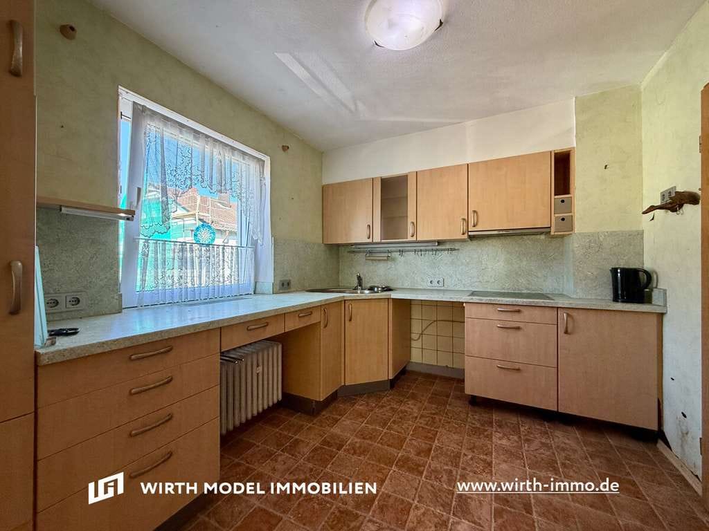 Immobilie in Poppenhausen - Einfamilienhaus mit Garage und Garten in schöner Ortsrandlage in Poppenhausen-Hain - Bild 4
